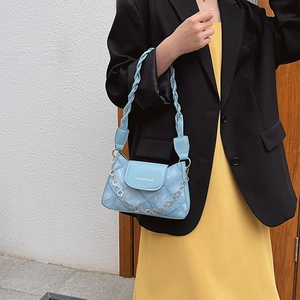 Quilted light blue shoulder bag with floral chain strap and woven handle for women