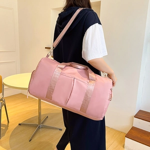 Pink large capacity sports gym bag with adjustable strap for travel and fitness