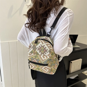Mini minimalist backpack with geometric jacquard pattern and adjustable black straps