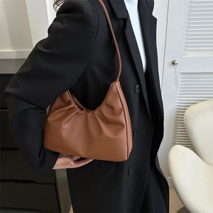 Chic brown ruched hobo bag with cloud-like pleats and slim shoulder strap for women