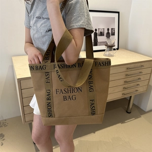 Brown canvas tote bag with fashion bag lettering for women's daily commute and casual use