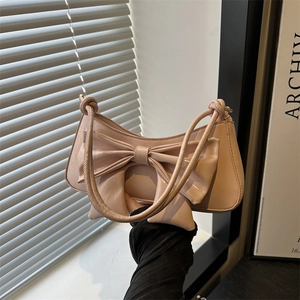 Sac Sous le Bras en Cuir PU avec Nœud Papillon pour Femmes Couleur Unie Sac à Épaule Chic Décor de Nœud Sac à Main Baguette