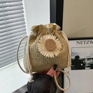 Women Summer Straw Woven Shoulder Bag Daisy Flower Drawstring Bucket Bag Casual Beach Vacation Handmade Crossbody Bag