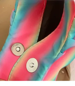 Detail of colorful gradient fabric underarm bag with double magnetic silver closures