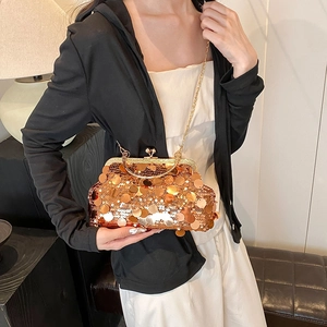 Rose gold sequined evening clutch bag with round metal handles and chain strap