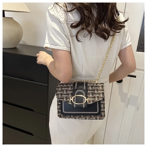 Detail of tweed and leather patchwork chain bag showing the back and side view on model