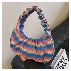 Detailed view of the gradient rainbow hobo bag with trendy pleated cloud-like straps