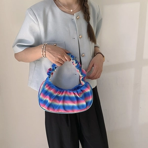 Rainbow gradient pleated crescent bag with elegant cloud design and trendy shoulder strap