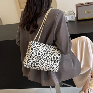 Chic leopard print crossbody tote bag with golden chain strap for modern women's fashion