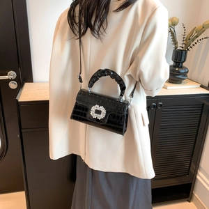 Fashionable black crocodile texture shoulder bag with rhinestone floral buckle and ruched handle