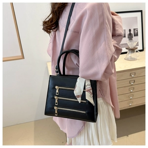 Black PU leather crossbody bag with triple gold zippers and decorative handle silk scarf