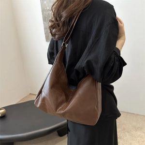 Deep brown large tote bag with patchwork faux leather design for stylish women commuting