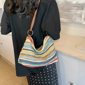 Bohemian colorful striped woven straw shoulder bag with brown leather strap detail