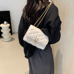 Chic white quilted crossbody bag with gold chain strap and metallic lock for women