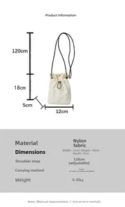 Detail view of mini nylon crossbody bag showing 12x18x5cm dimensions and adjustable strap