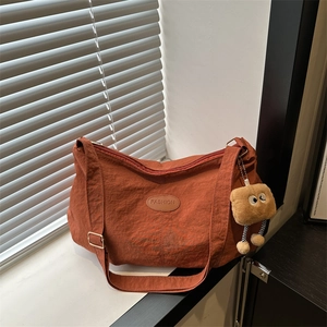 Women's Casual Canvas Shoulder Bag Large Capacity Half-moon Tote Bag Trendy Solid Color Crossbody Bag With Plush Charm