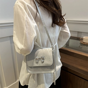 Sleek silver bow-knot small square crossbody bag with textured finish for women