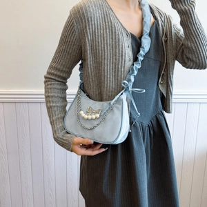 Light blue crescent shoulder bag with bow and pearls, chic trendy crescent design bag