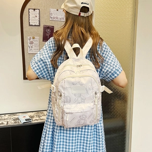 Cream-colored high school backpack with bear prints and large storage capacity