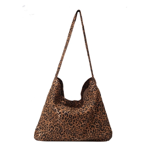 Large leopard print tote bag with spacious canvas design and comfortable shoulder strap