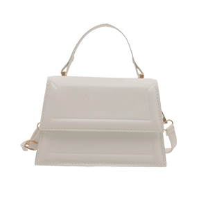 Minimalist white leather crossbody bag with geometric stitching and gold hardware
