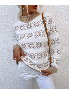 Close-up of Nordic snowflake jacquard pattern on white knit sweater with ribbed neckline
