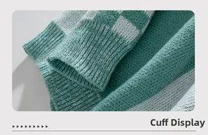 Detailed macro view of mint green and white checkered knit sweater cuff with ribbed texture