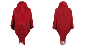 Front and back view of red knit poncho featuring a faux fur collar and fringed hem details