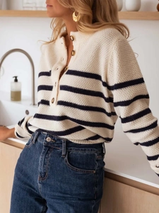 Women's striped knit sweater featuring a button placket and long sleeves for casual style