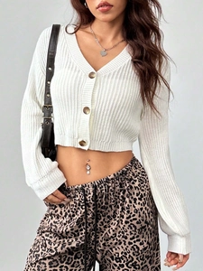 Women's white V-neck cropped knit cardigan with button-front and ribbed texture