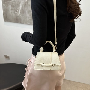 Minimalist cream white crossbody bag with lychee texture and flap cover for women