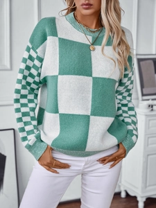 Women's mint green and white checkered knit sweater with a relaxed fit and crew neck