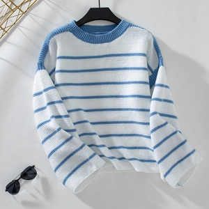 Detailed knit texture of blue and white striped loose-fit crewneck long sleeve sweater