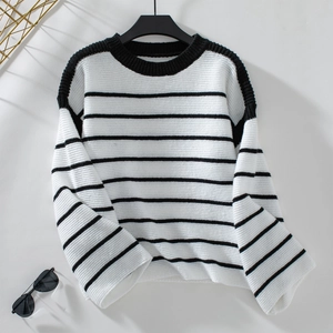 Detailed view of striped knit sweater with ribbed crewneck and loose-fit drop shoulder