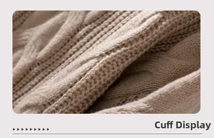 Detailed macro view of beige cable knit sweater cuffs with thick ribbing texture