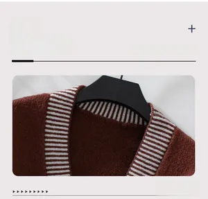 Close-up of contrast ribbed neckline with white stripes on a brown knit cardigan