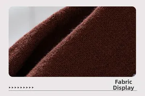 Detailed macro shot of dark brown knit fabric texture showing high-quality cozy material