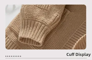 Detailed macro view of the ribbed knit cuffs on a beige long sleeve cardigan