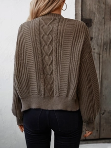 Women's vintage cable-knit cardigan sweater in solid brown with loose back design