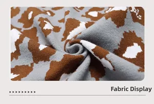 Detailed macro view of soft leopard print knit fabric showing texture and fibers