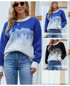 Detail of crewneck knit sweater showing the gradient drip texture in blue and black colors