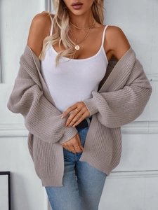 Oversize chunky knit long cardigan sweater in oatmeal neutral tone for women