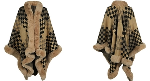 Detail of the thick faux fur collar and knit brown checkerboard pattern on the warm poncho