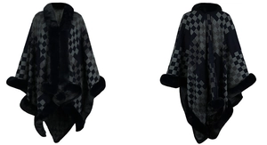 Detail of checkered knit shawl with thick faux fur trim and winter cape texture