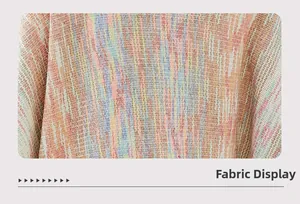 Detailed close-up showing rainbow knit fabric texture with pink and blue yarns
