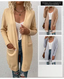 Detail of ribbed cuffs and large side pockets on a long sleeve open front knit cardigan