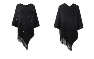 Detailed knit poncho texture showing wave patterns, fringe trim, and pearl accents