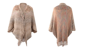 Detail of multi-color knit poncho cardigan with bohemian tassels and fringe hem