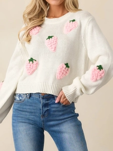 White knit sweater with 3D strawberry appliques and crew neck for a sweet autumn look