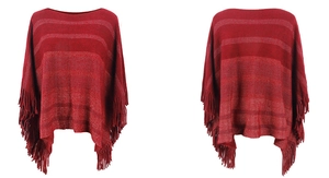 Close-up of red striped knit poncho featuring elegant tassel fringe and boat neck detail